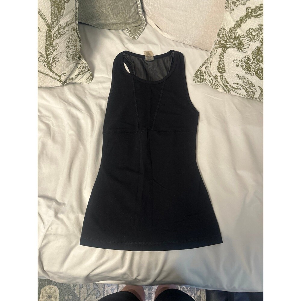 Black TNA tank with mesh detail